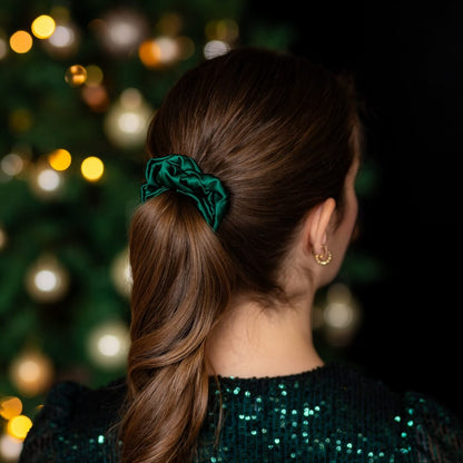 Brown hair styled with a pine green wide silk scrunchie 3.5 cm voluminous hair tie from behind