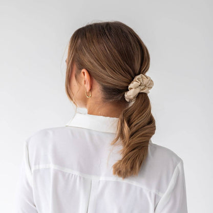 Brown hair styled with a champagne wide silk scrunchie 3.5 cm voluminous hair tie from behind