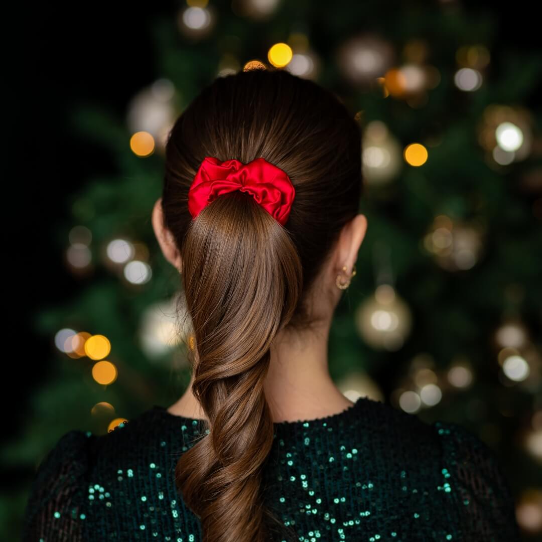Brown hair styled with a red wide silk scrunchie 3.5 cm voluminous hair tie from behind